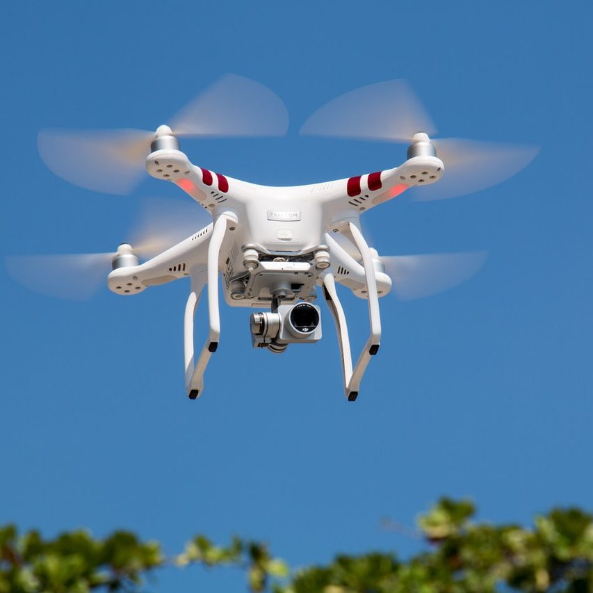 drone-flying-against-blue-sky-336232